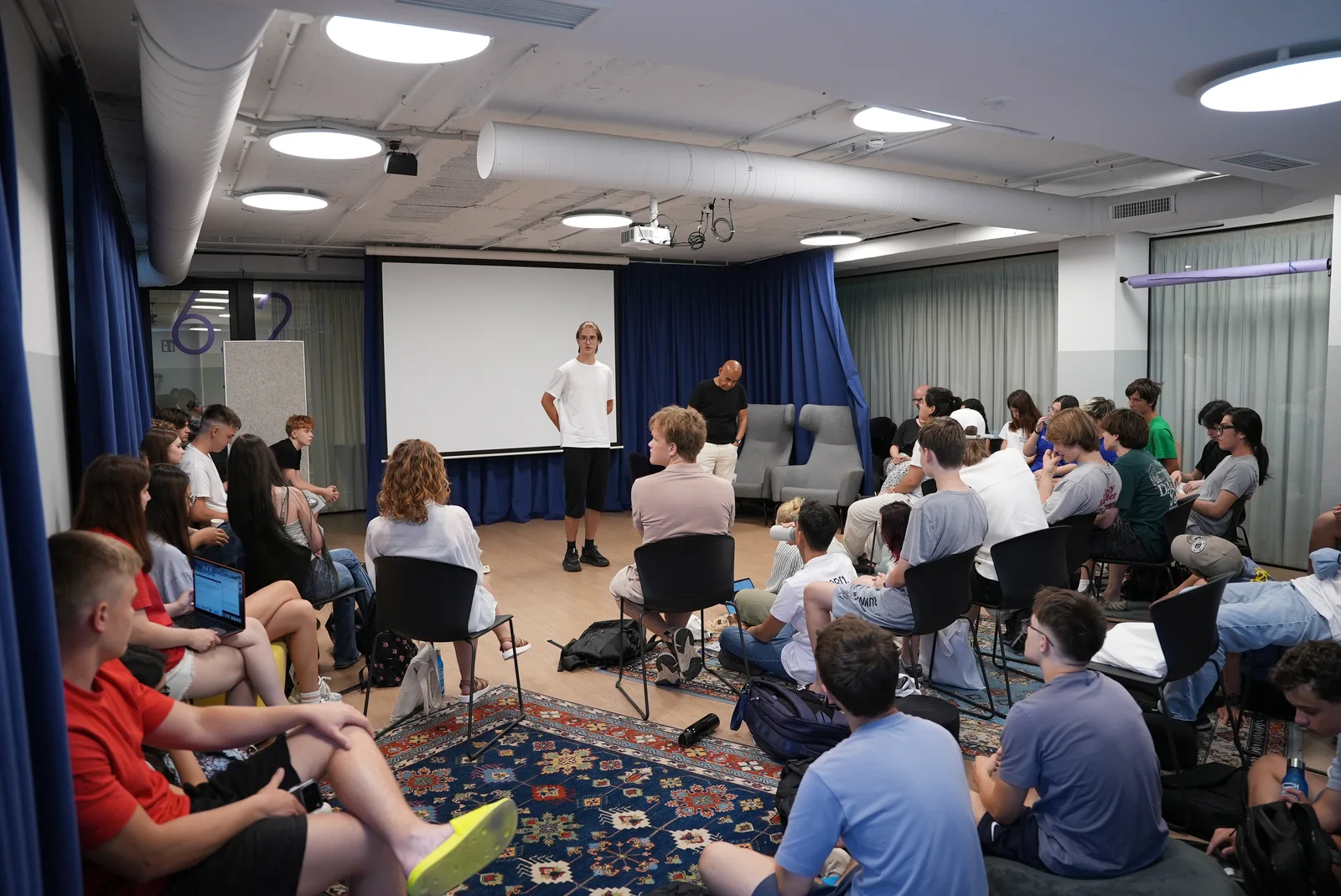 Students and mentors in a group discussion