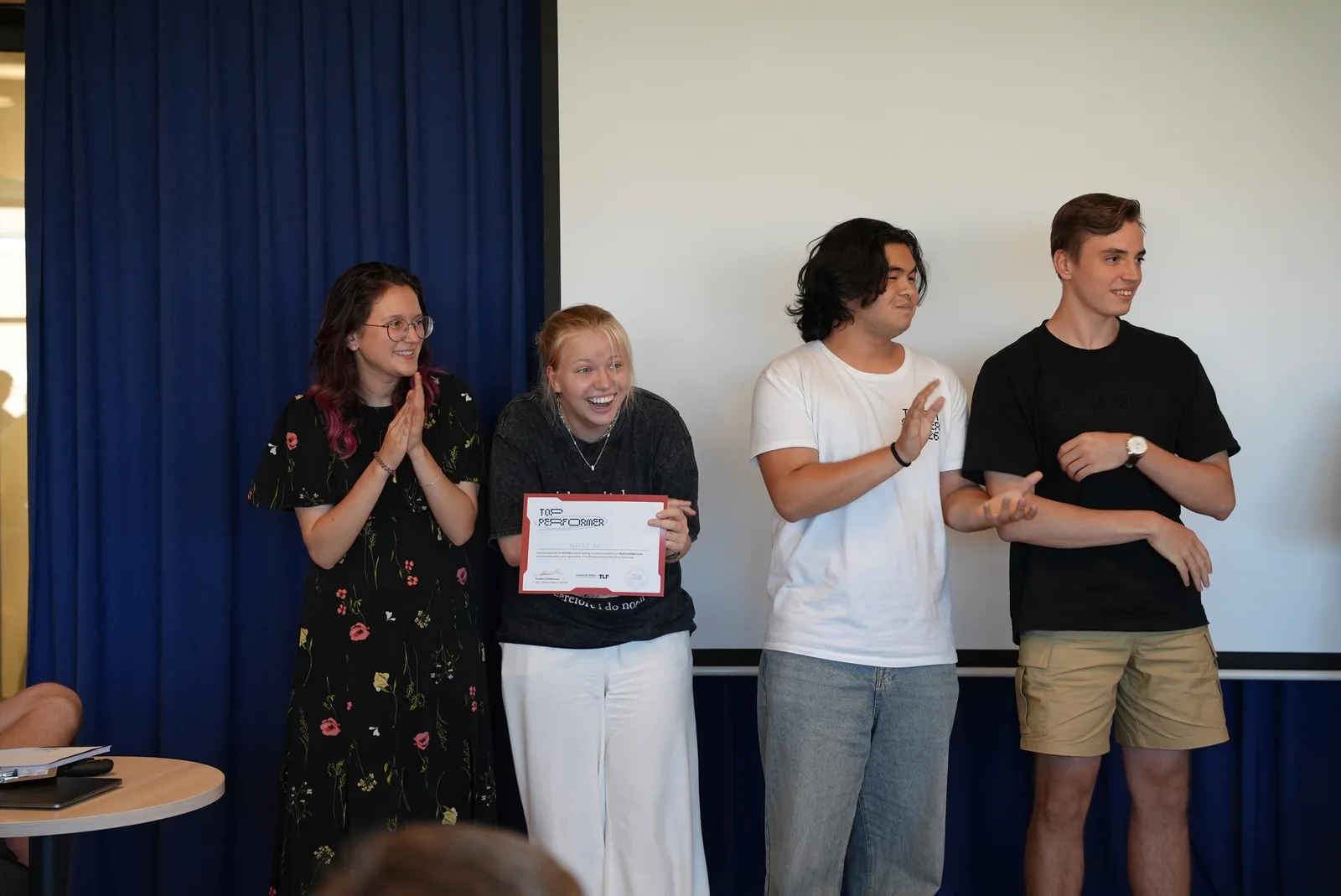 Students celebrating after the final presentations